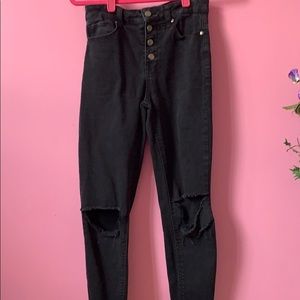 High waisted ripped knee jeans